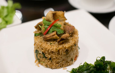 Fried fish serv with rice, selection focus point