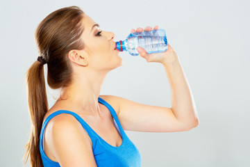 young woman drinking water  profile portrait