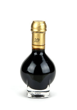 Traditional italian balsamic vinegar inside a special bottle iso