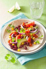 vegan taco with vegetable, kidey beans and salsa
