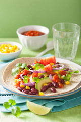 vegan taco with vegetable, kidey beans and salsa