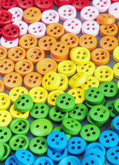 Obraz premium Mixed coloured bright buttons background