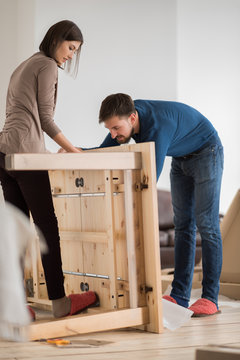 Couple Assembling Furniture