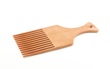 afro pick on white background