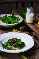 The baked fish fillet with a ramson