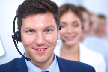 Attractive positive young businesspeople and colleagues in a