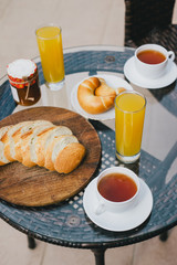 Breakfast for two persons on a balcony with beautiful sea view