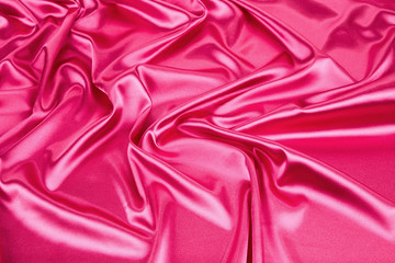 Close up of pink silk texture cloth.