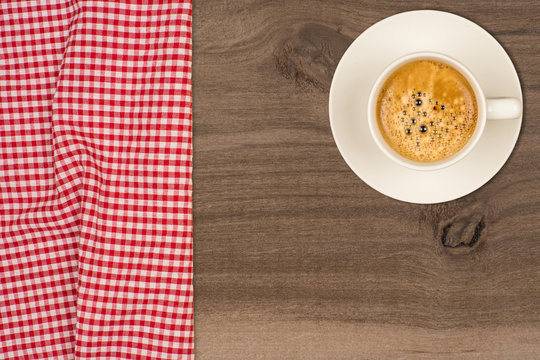 Coffee Cup On Wooden Table Texture. View From Above