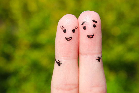 Finger Art Of A Happy Couple. A Man And A Woman Hug