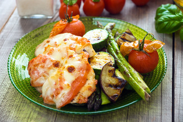 Chicken with mozzarella, tomato and vegetable