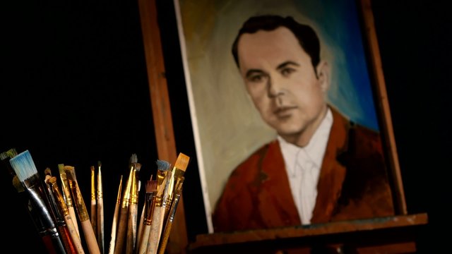 Different brushes, rotation, with easel and painting of talanted