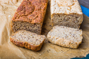 Freshly baked homemade bread on a wooden kitchen table
