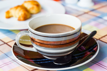 Coffee cup on the table at the coffee shop.