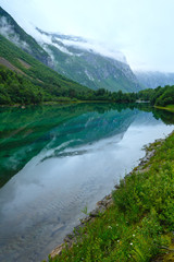 Naklejka na ściany i meble Mountain lake with clean water (Norway).