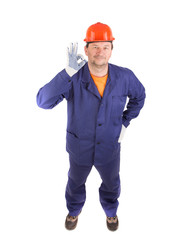 Worker showing five in rubber glove.