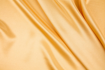 Yellow cloth silk texture close up.
