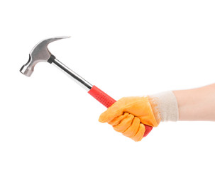 Man's hand in glove holding hammer.