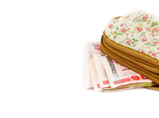 Thai money in woman wallet.