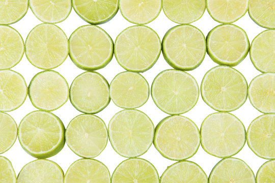 Sliced citrus fruits on a white background