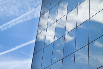 Fototapeta na wymiar Windows of the building against the sky