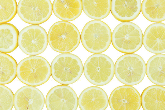 Sliced citrus fruits on a white background