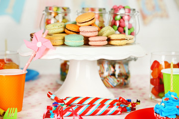 Prepared birthday table with sweets for children party