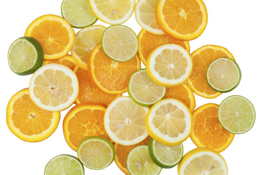 Sliced citrus fruits on a white background