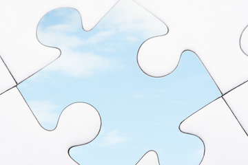 Puzzle pieces, one cloud piece