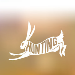 Creative design of running rabbit inside hare silhouette on © Dashikka