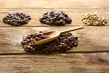 Coffee beans on wooden background