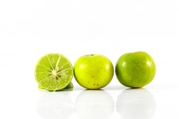 limes on white background