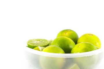 limes on white background