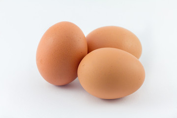 three eggs isolated on white background