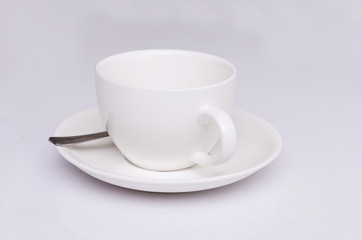 Coffee cup on white background - soft focus