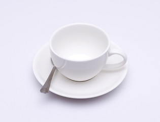 White coffee cup on white background