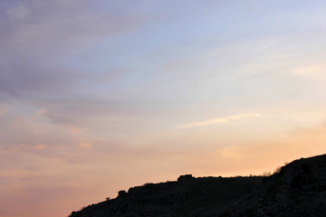 Hill and Blue sky background with clouds
