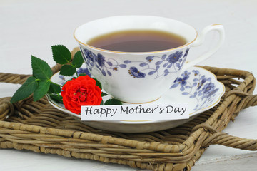 Happy Mother's Day card with cup of tea and red wild rose
