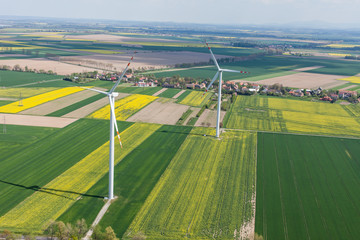 Obraz premium aerial view of wind turbine on a field