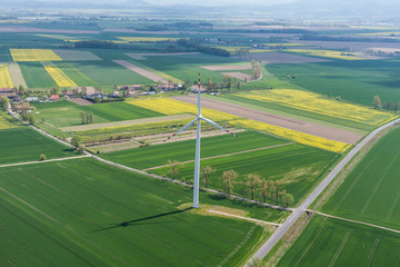 aerial view of wind turbine on a field