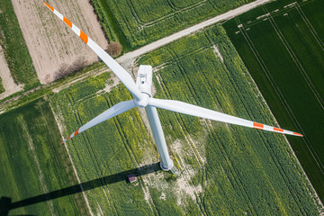aerial view of wind turbine on a field