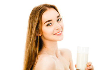 beautiful woman drinks milk