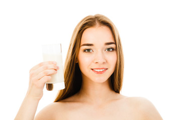 beautiful woman drinks milk