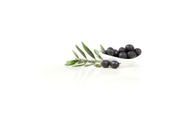 Black olives in a white background