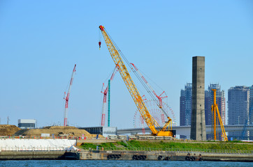 Fototapeta na wymiar Construction site of the development district. Toyosu, Tokyo