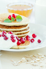 Pile of pancakes with berries