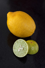 Limes on black granite