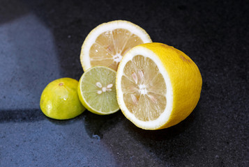 Limes on black granite