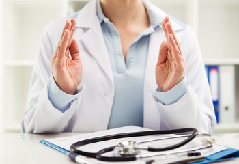 Young female medic promoting something. Medicine and health care