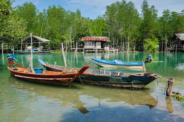 Plakat Wood Boats of Fisherman Parking at Riverside.